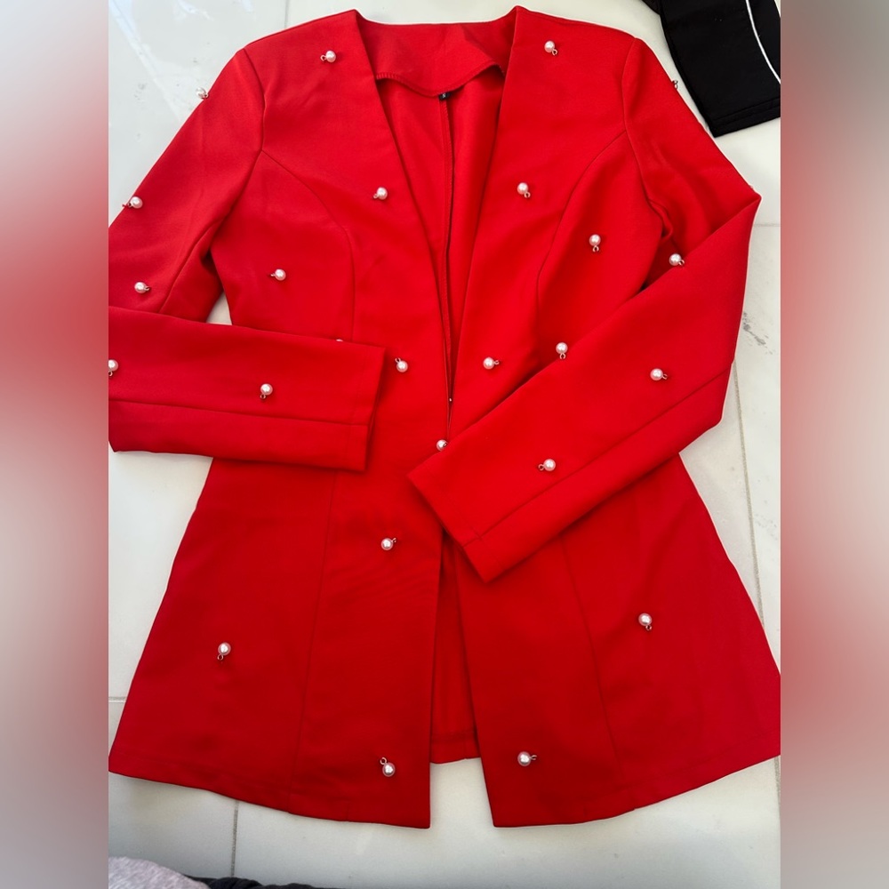 Red jacket w pearls
